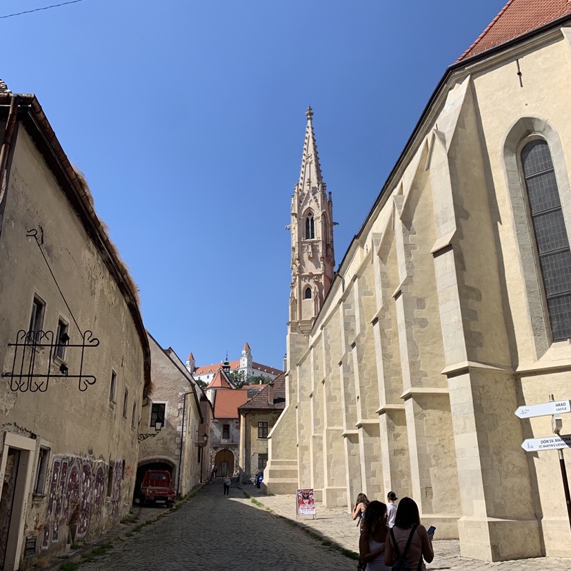 Kapitulska Street. An medieval cobbled road advised to visit in the Bratislava travel guide.