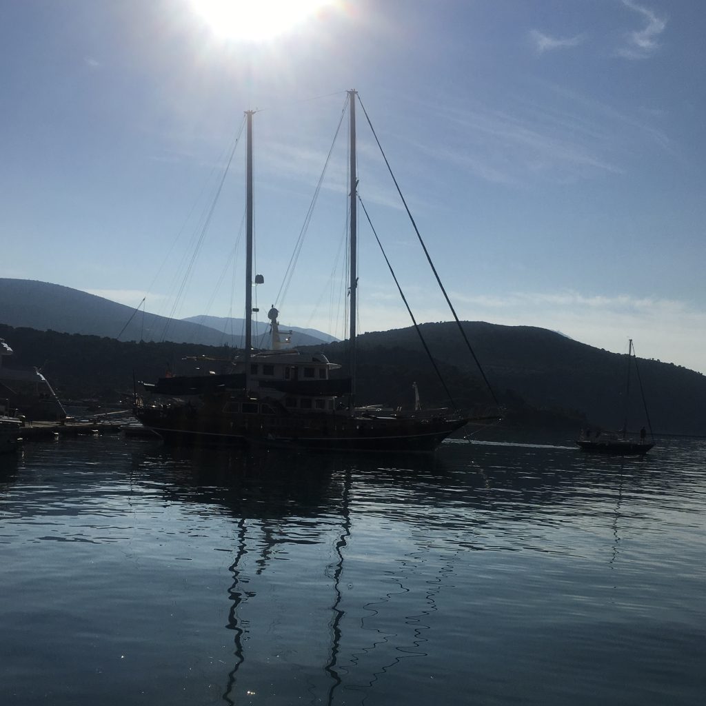 A harbour with the sun shining as part of the Lassi, Kefalonia guide.