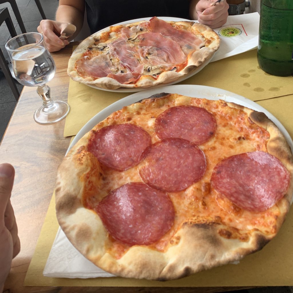 Pizzas with different ham toppings. Try any one with a 3 day itinerary in Rome. 