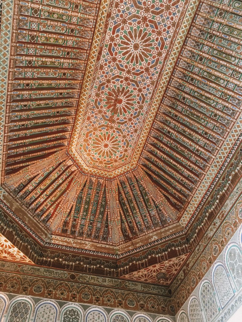 Different patterns on the ceiling of Bahia Palace. Part of the things to do in Morocco