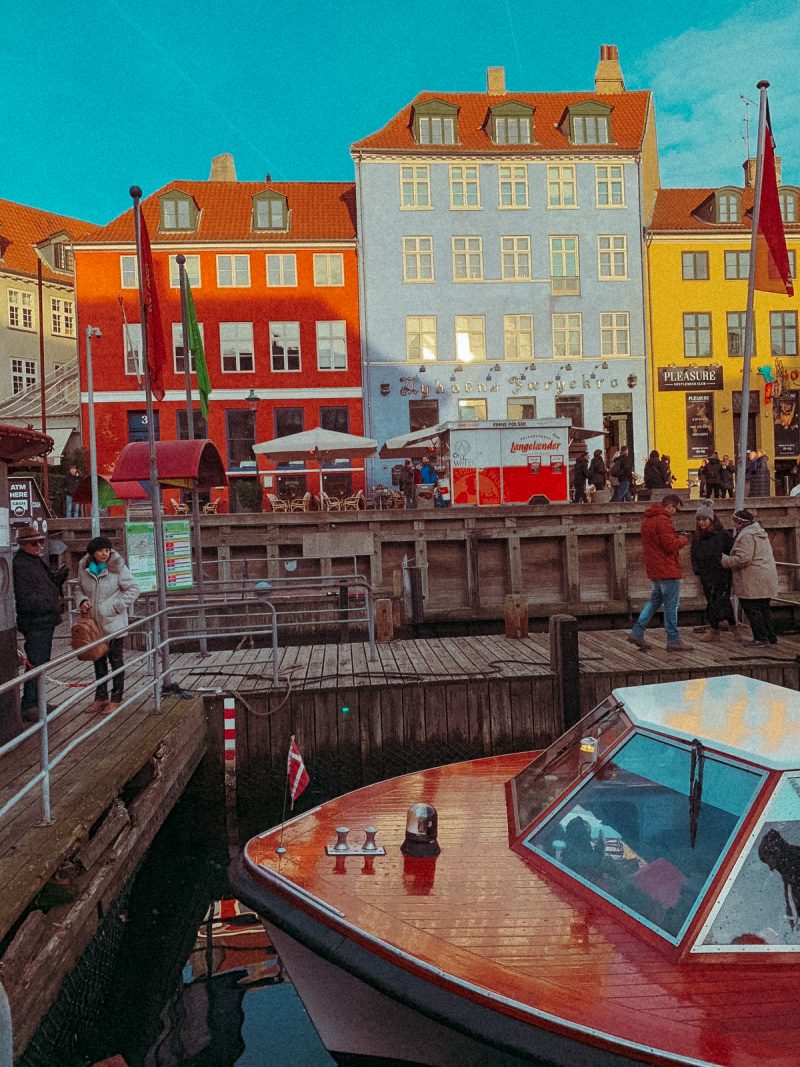 Colourful buildings and a boat in Nyhavn buildings. Part of 3 days in Copenhagen.