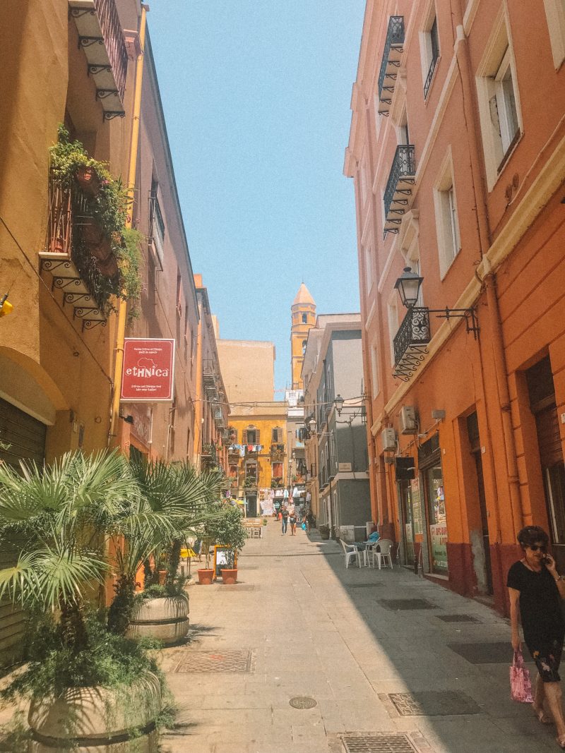 A side street in Cagliari with colourful buildings. Things to do in Cagliari