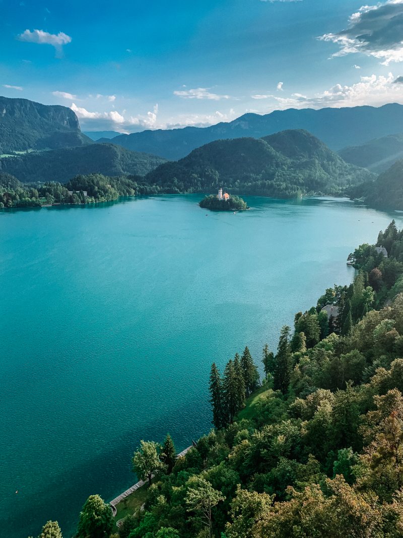 A view of Lake Bled from the castle with the lake, island and church in the middle. Things to do in Lake Bled
