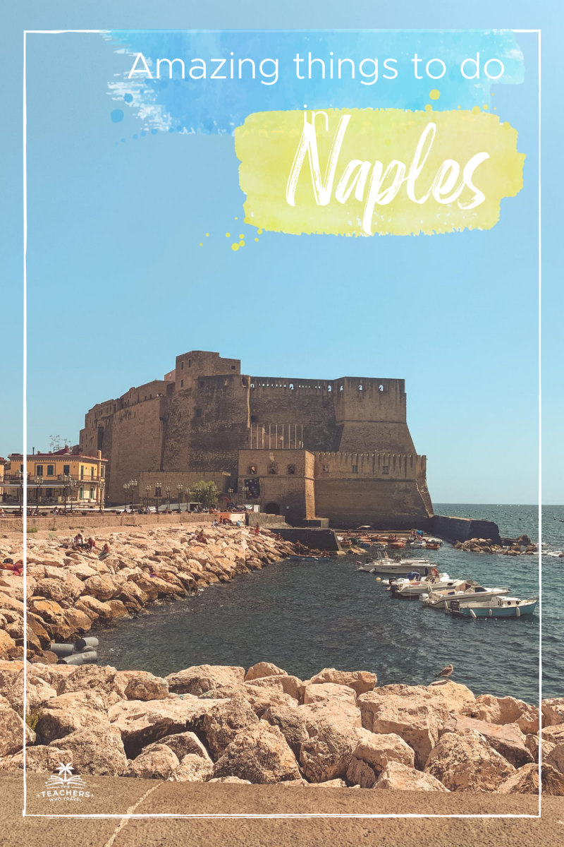 Naples castle with colourful buildings nearby. Things to do in Naples