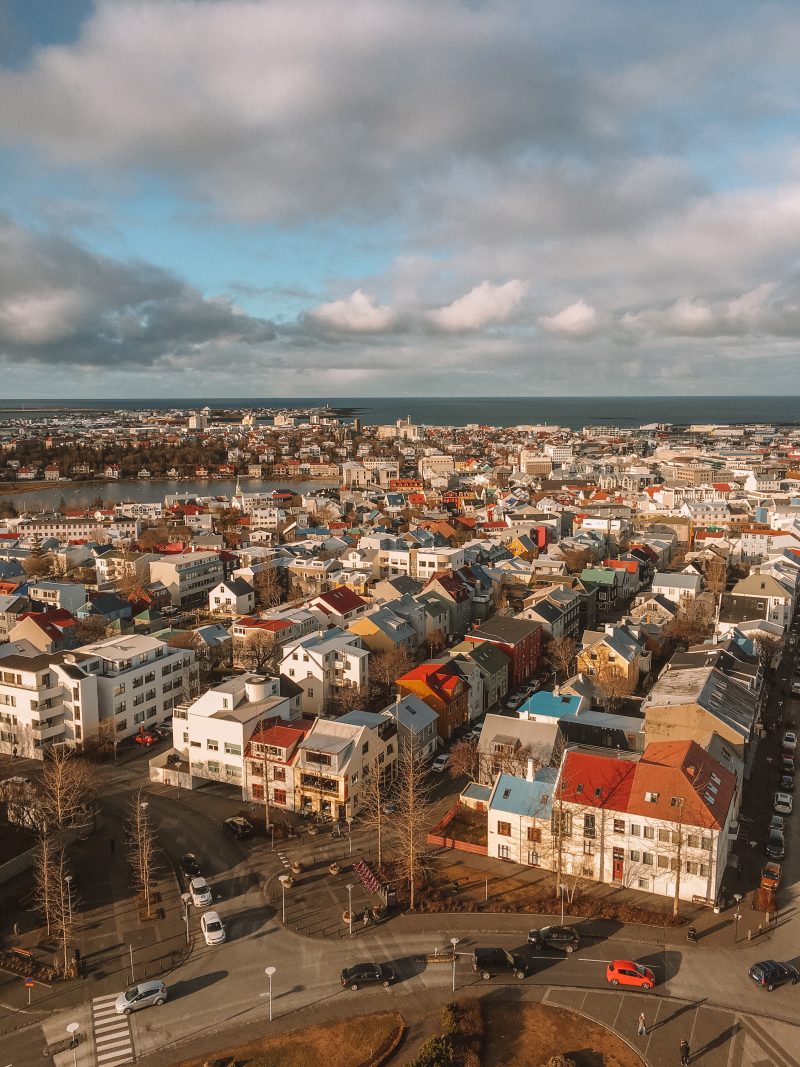 Hallgrimskirkja church with different coloured houses. Things to do in Iceland