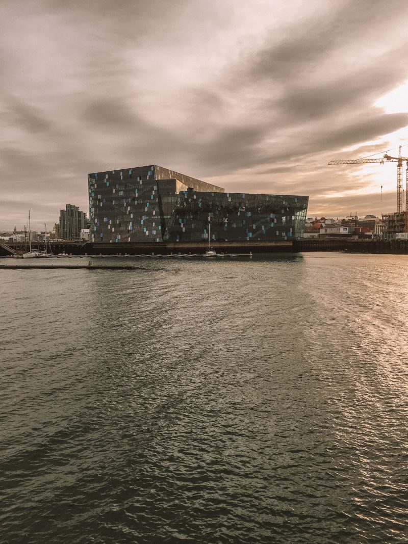 Harpa Concert Hall with the sea nearby in Reykjavik.