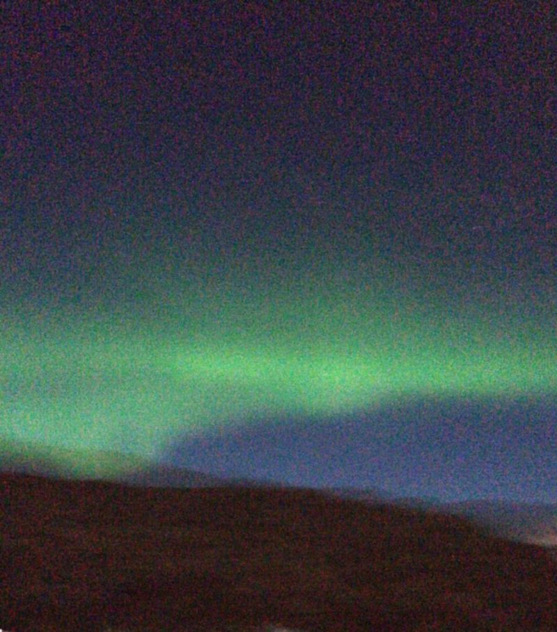 Green northern lights in the sky. Things to do in Iceland