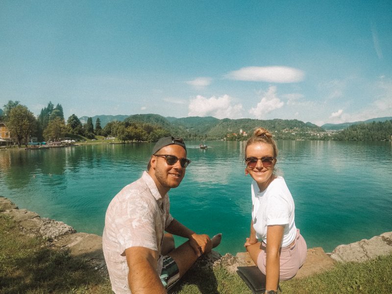 A couple taking a selfie at Lake Bled. What to do at Lake Bled