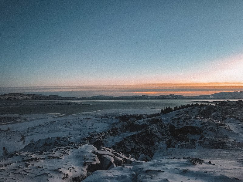 Thingvellir National Park with the sunsetting in the background. What to do in Iceland