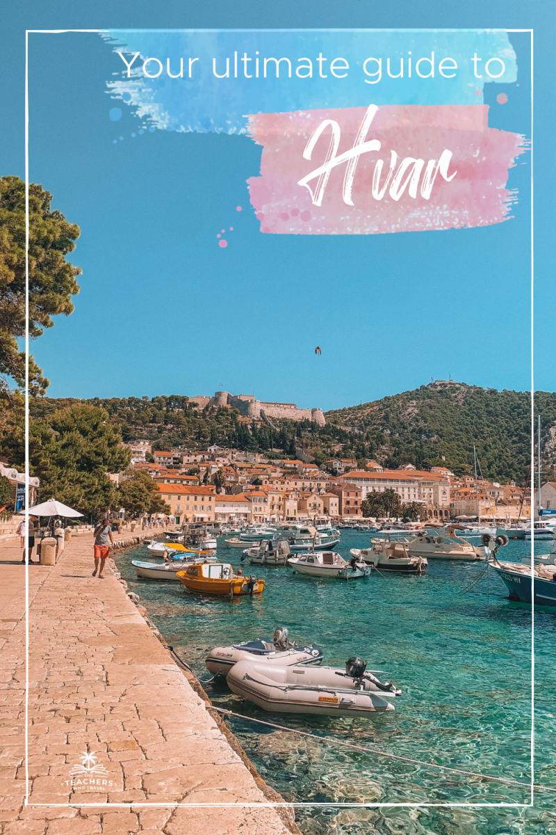 Hvar harbour with the old town, boats and a castle on a hill. Things to do in Hvar