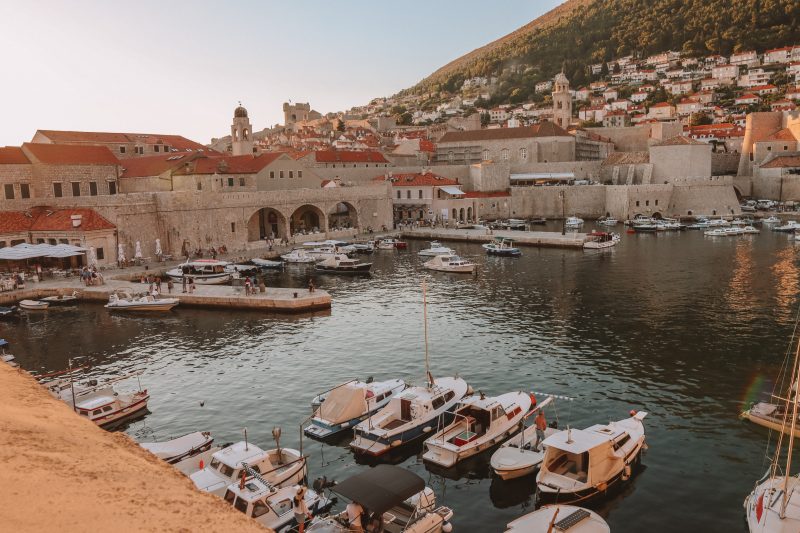 Boats in the sea by Dubrovnik harbour.