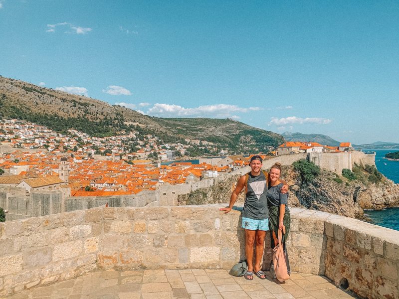 A couple on Lovrijenac fort with the old town in the background