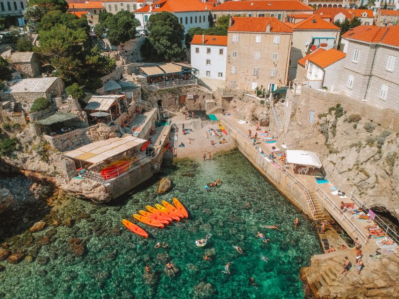 Šulići beach aerial picture with turquoise sea and orange kayaks