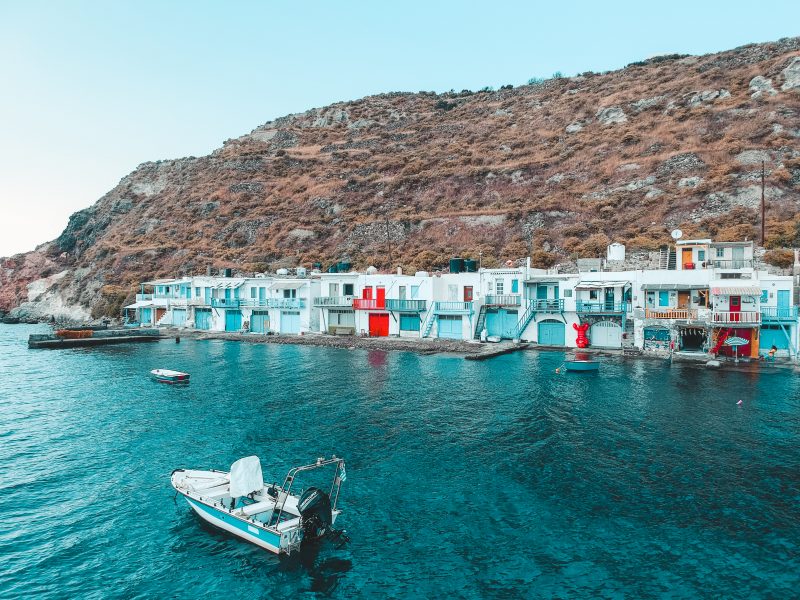 Klima village with nearby boats. Things to do in Milos