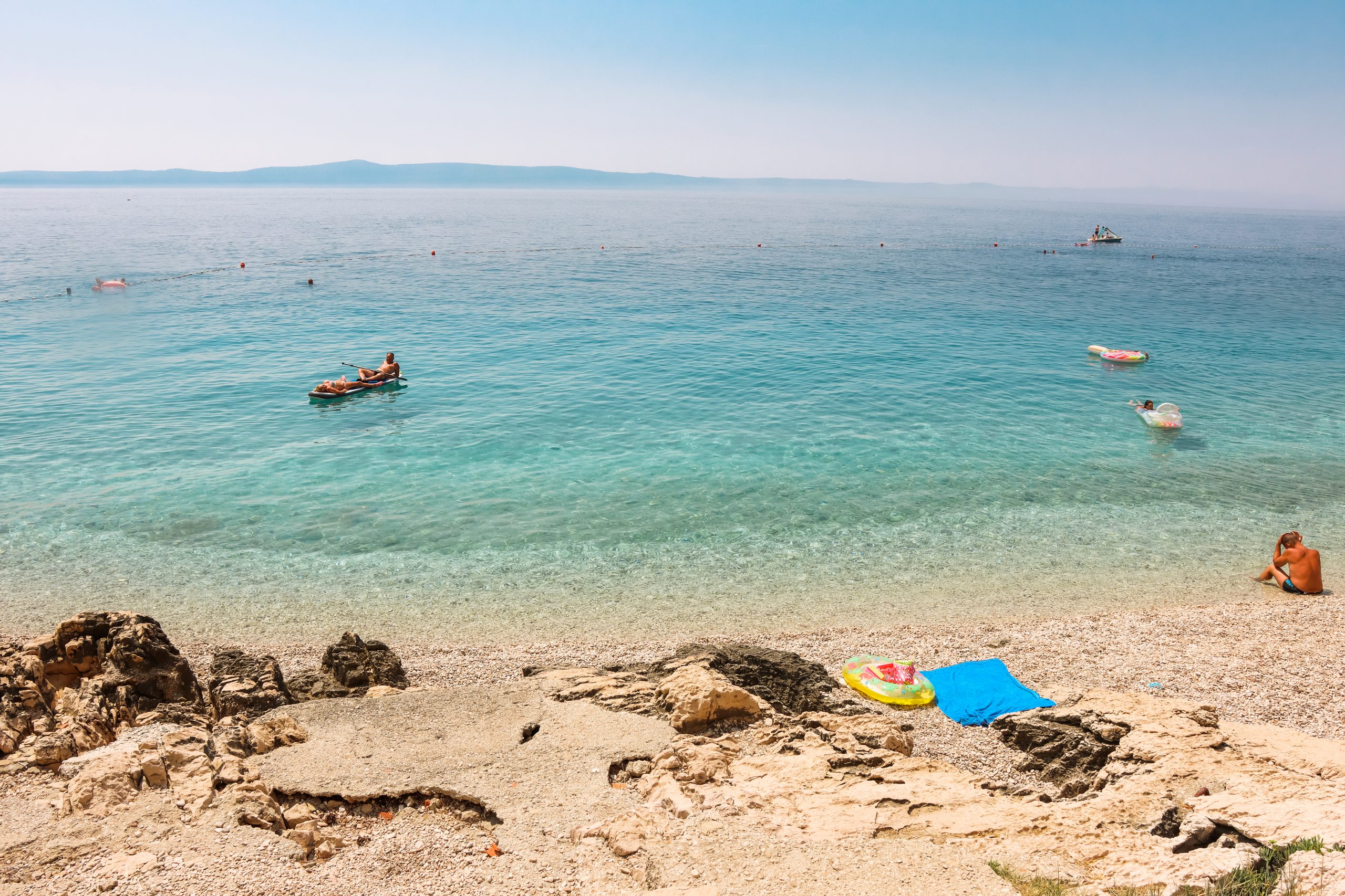 Clear blue water at Tucepi beach. Your guide to the croatian riviera