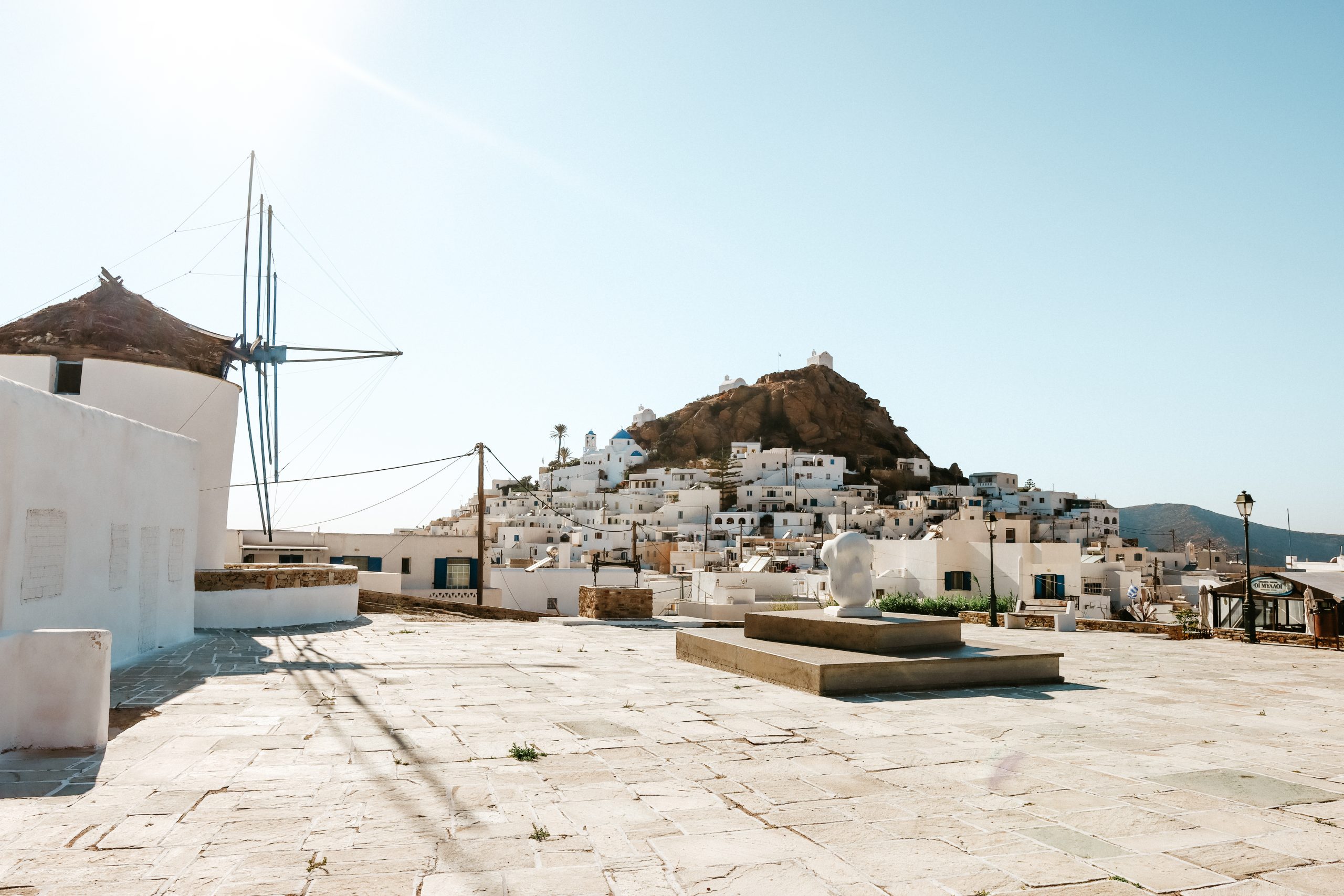 Windmills with Chora in the background. Ios travel blog