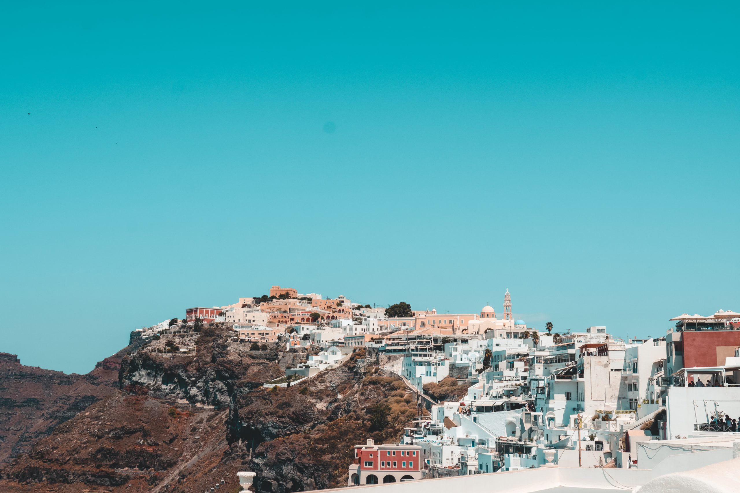 A view of the pastel buildings in Thira