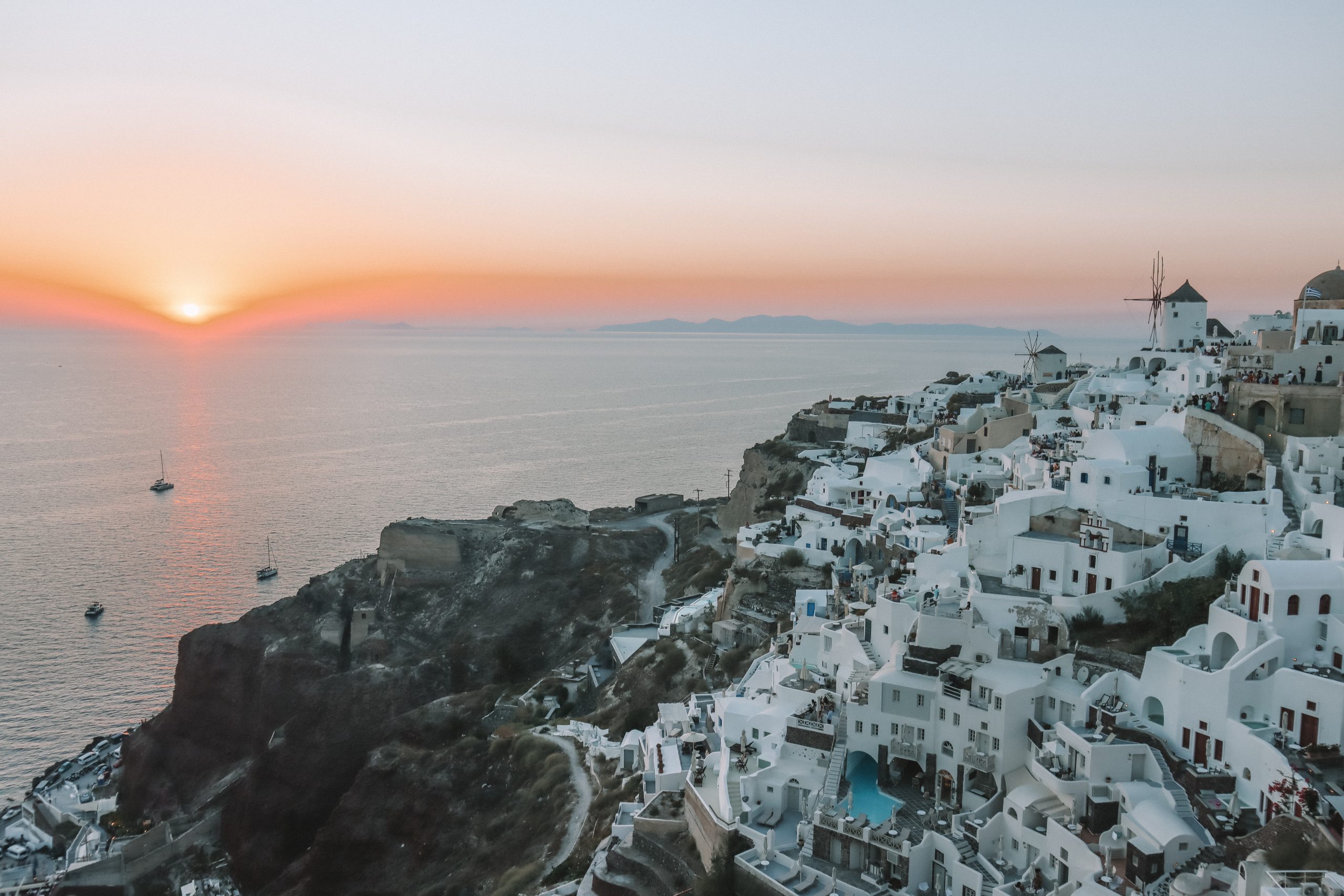 Oia ocean and buildings during sunset