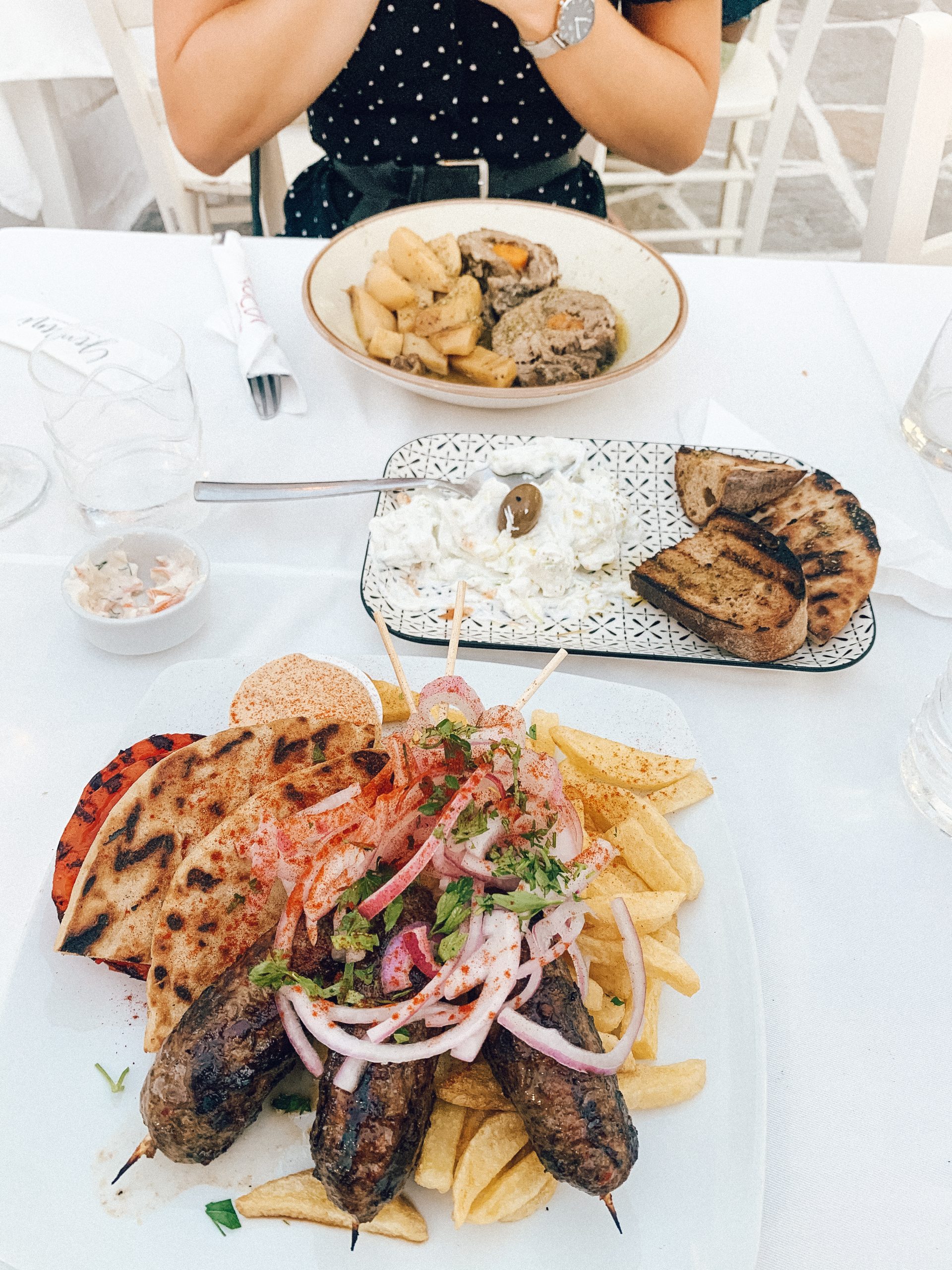 A meat, chips, tzatziki and pitta platter. Where to eat in Naoussa