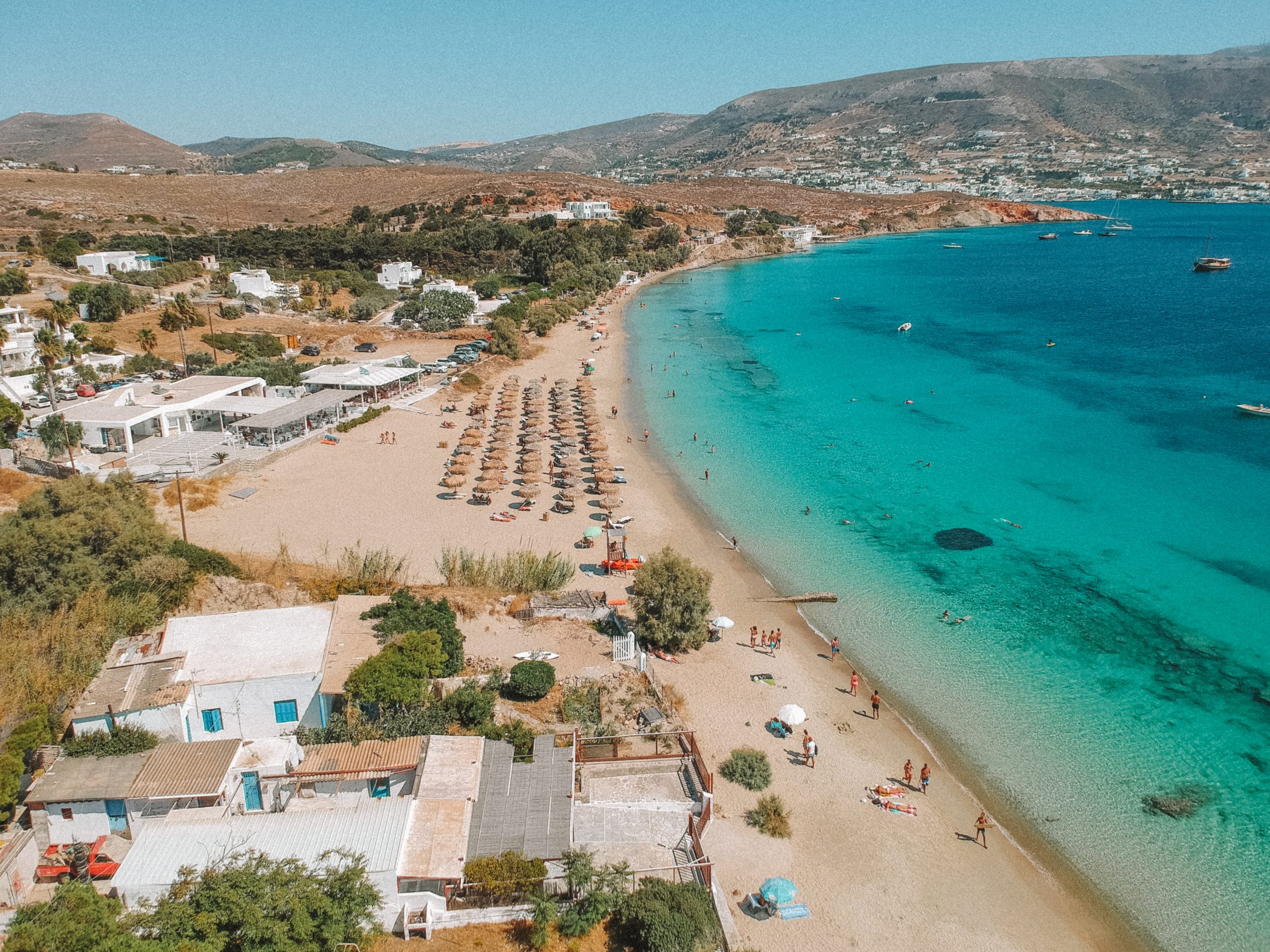 Martselo beach from above with parasols and turquoise waters. Things to do in Paros