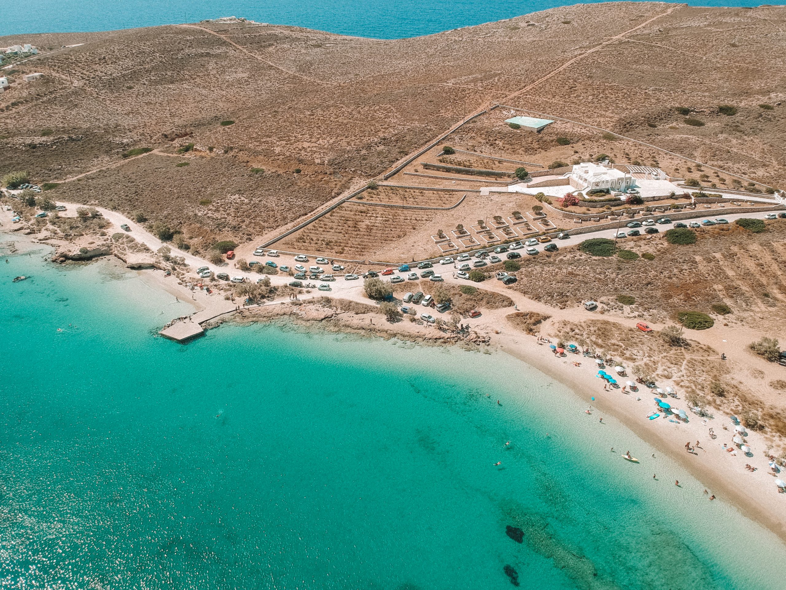 A turquoise Martselo beach from the front with golden sand. Best beaches in Paros